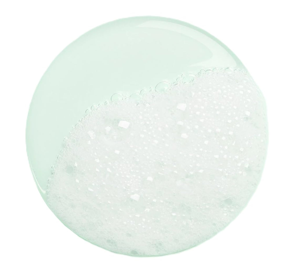 Lather texture on skin image highlighting easy rinse formula.