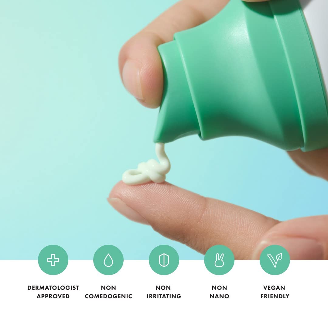 Close-up of 50 ml bottle emphasizing compact, travel-friendly sunscreen