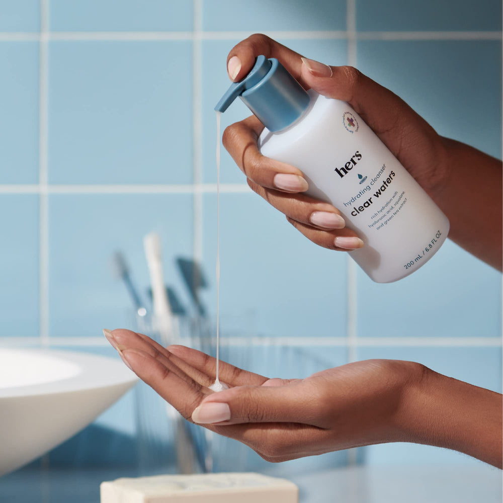 Close-up of light foam texture on skin as cleanser is applied