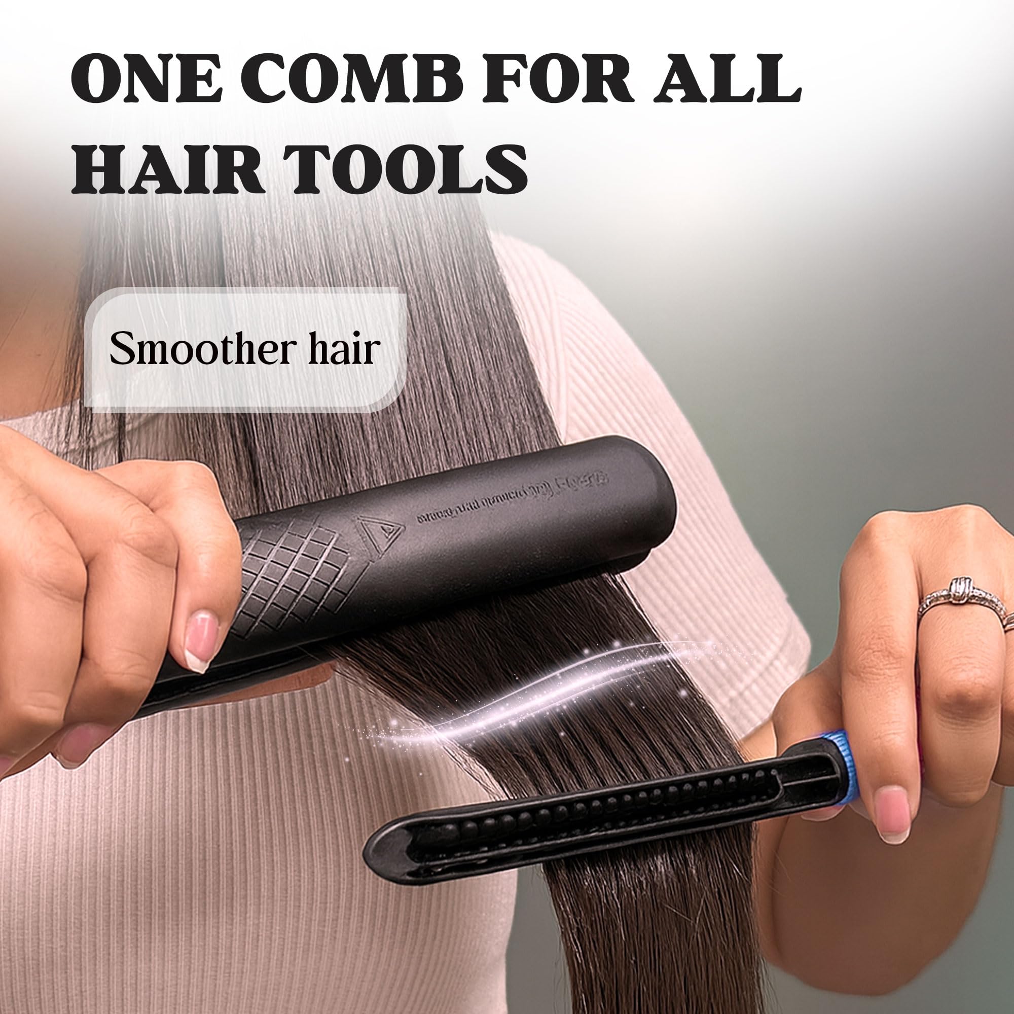 HerStyler easy comb in hand blue demonstrates a comfortable grip for precise styling.