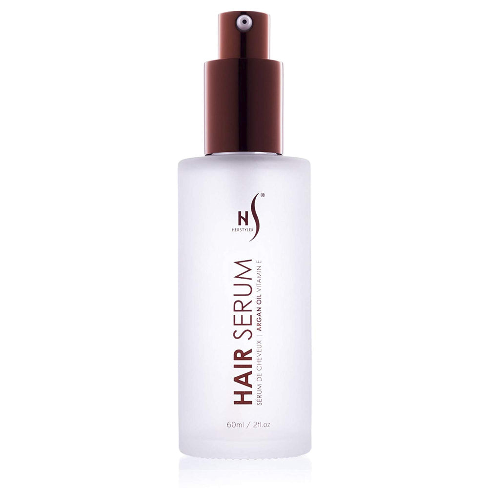 HerStyler Hair Repair Serum bottle with argan oil for frizz control.
