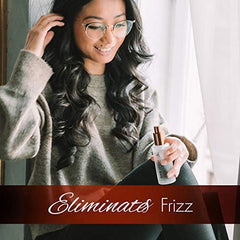 HerStyler Serum hair shine closeup highlights glossy, healthy-looking strands.