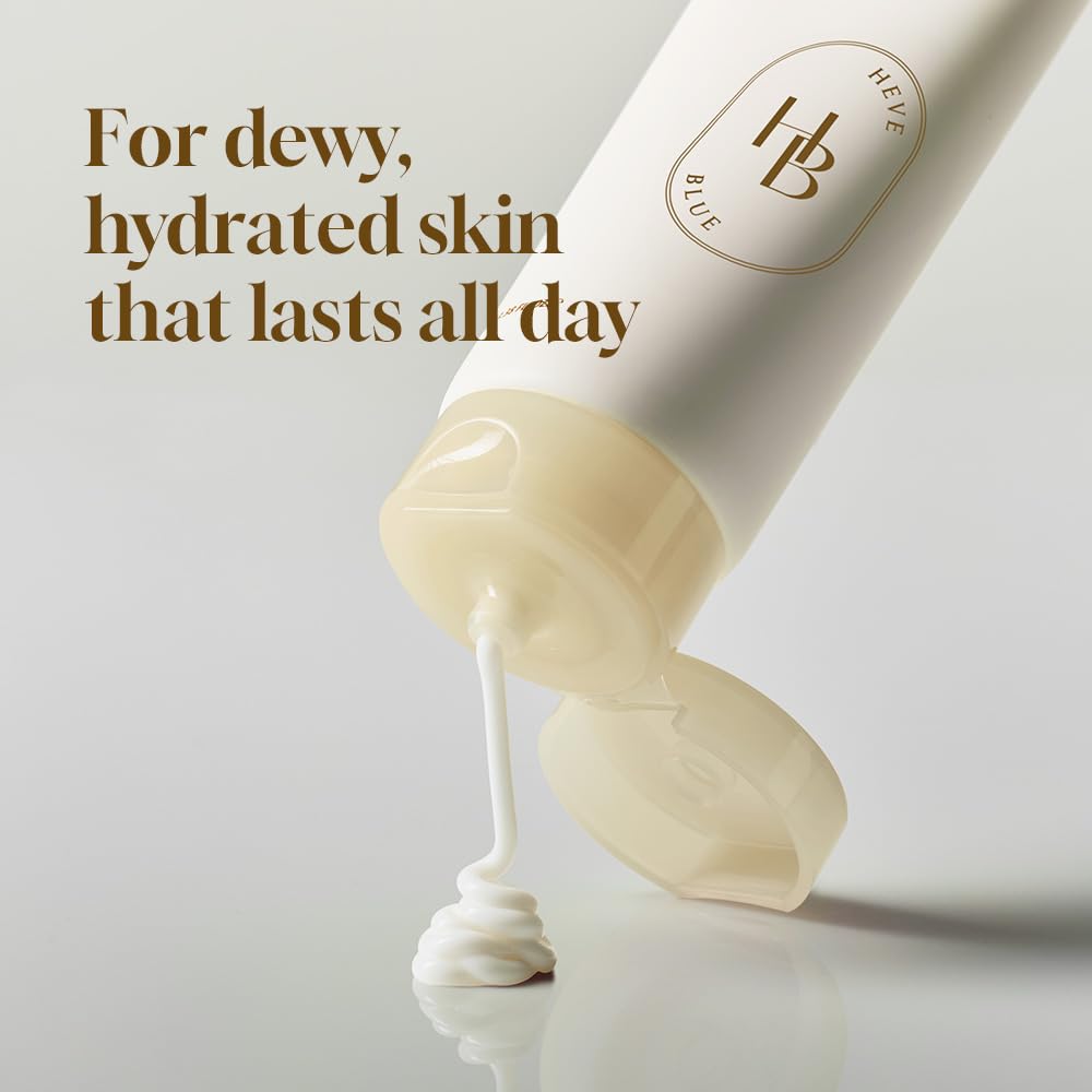 Applying HEVEBLUE cream to cheeks during daily skincare routine