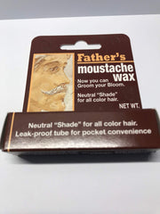 Close-up of HGFLMR Colonial Dames wax stick being applied for precise, natural-looking grooming.