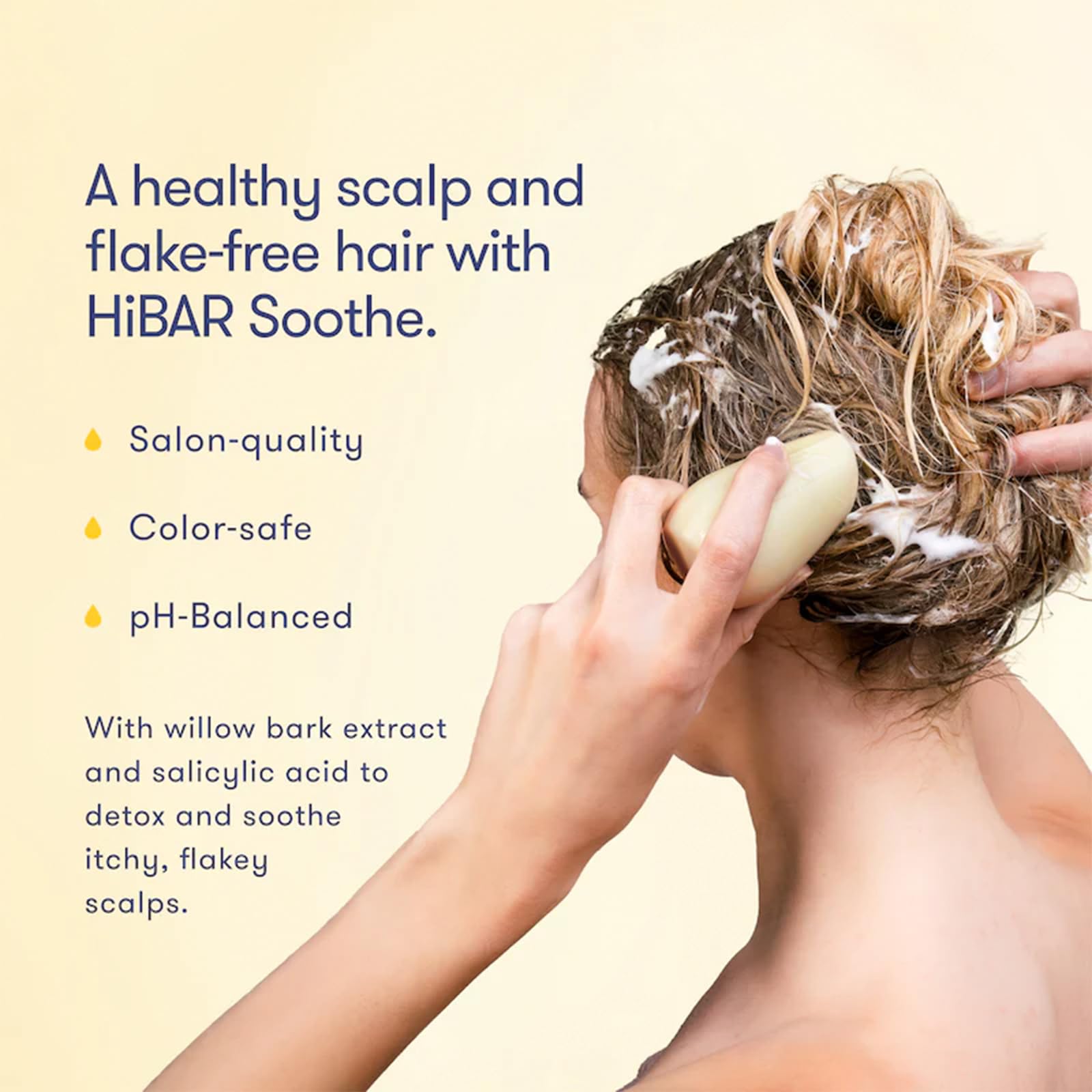 HIBAR Soothe Shampoo Bar lathering on hair for refreshing cleanse.