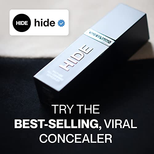 Shade-matching swatch from Hide Concealer showing Natural Beige option.