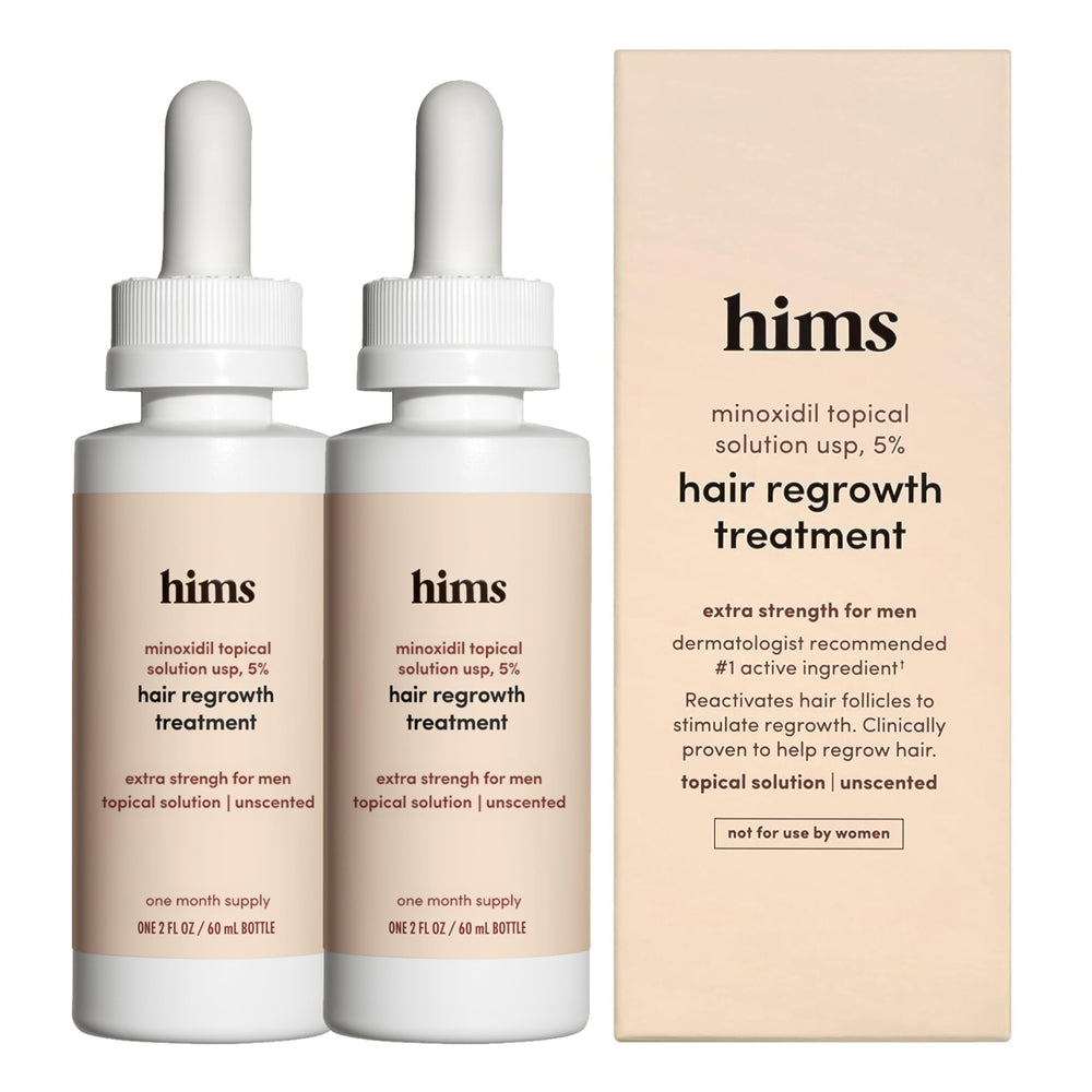 hims Hair Regrowth Treatment bottle pour showing precise dispensing on scalp