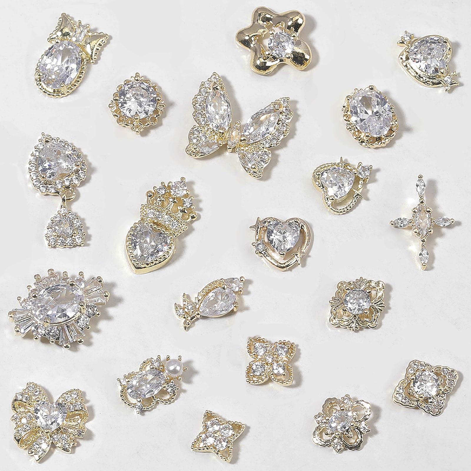 HNUIX 3D nail rhinestones fit natural or acrylic nails with curved bases.