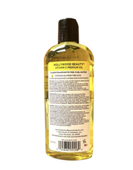 Hollywood Beauty Vitamin E Oil applied to hair ends for shine