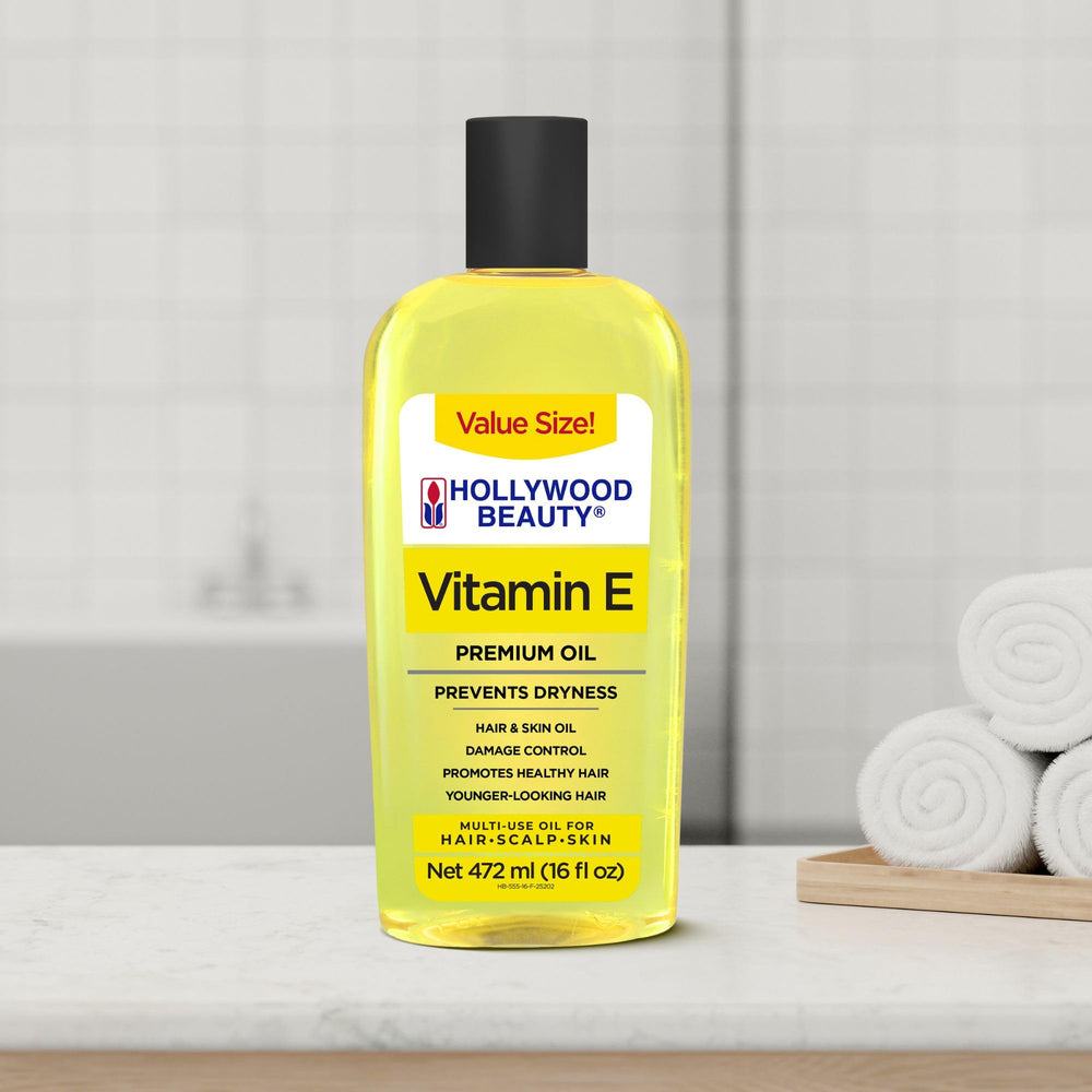 Hollywood Beauty Vitamin E Oil on skin for softness and glow.
