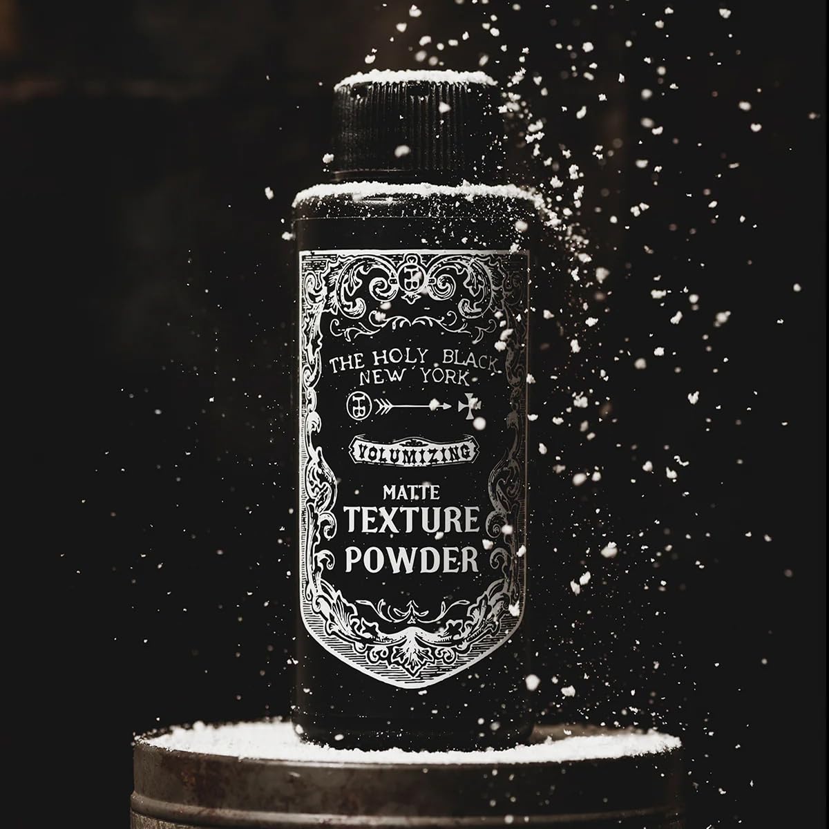 HOLY BLACK Matte Texture Powder bottle emphasizes travel-friendly packaging