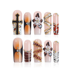 Homsera press-on nails with 3D floral motifs for a striking at-home manicure.