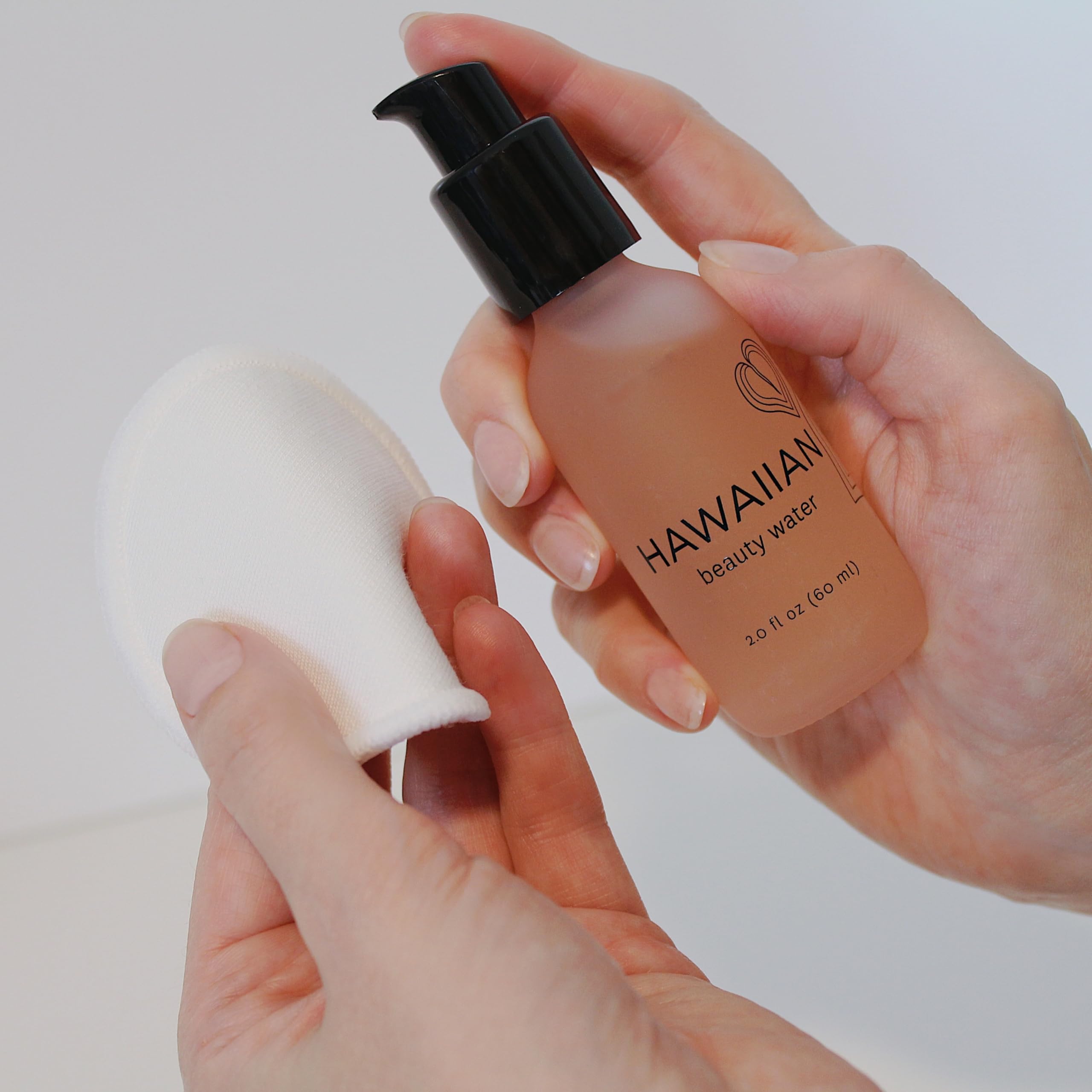 Ingredients like hibiscus and papaya enzymes in Honua Beauty Water for gentle exfoliation