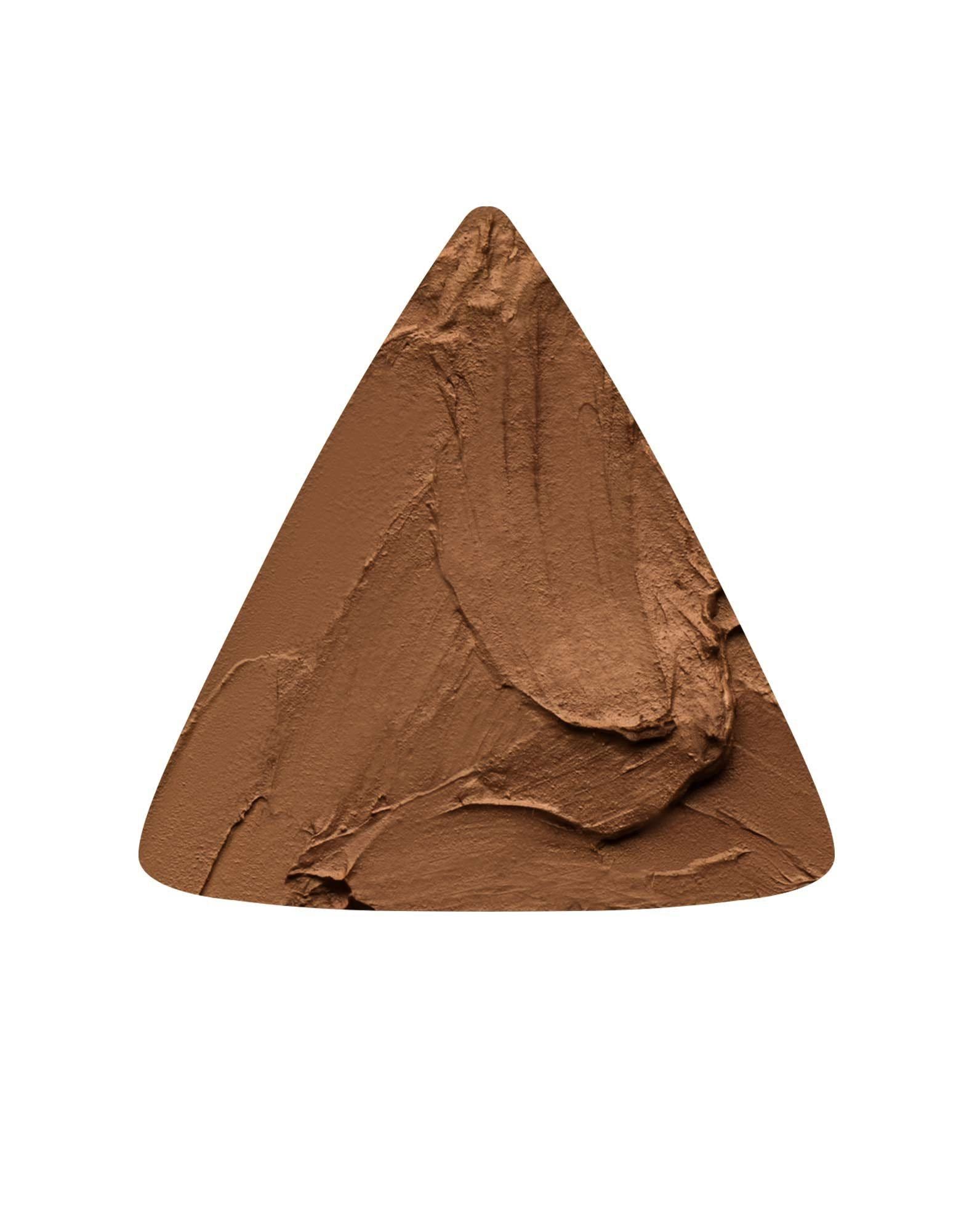 Hourglass Vanish Seamless Finish Foundation Stick applied to the skin for an airbrushed, long-wearing look.
