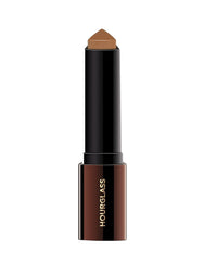 Hourglass Vanish Foundation Stick cap: portable for quick touch-ups.