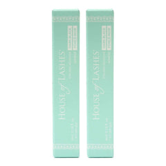 House of Lashes Dark Adhesive applying false lashes for a seamless blend.