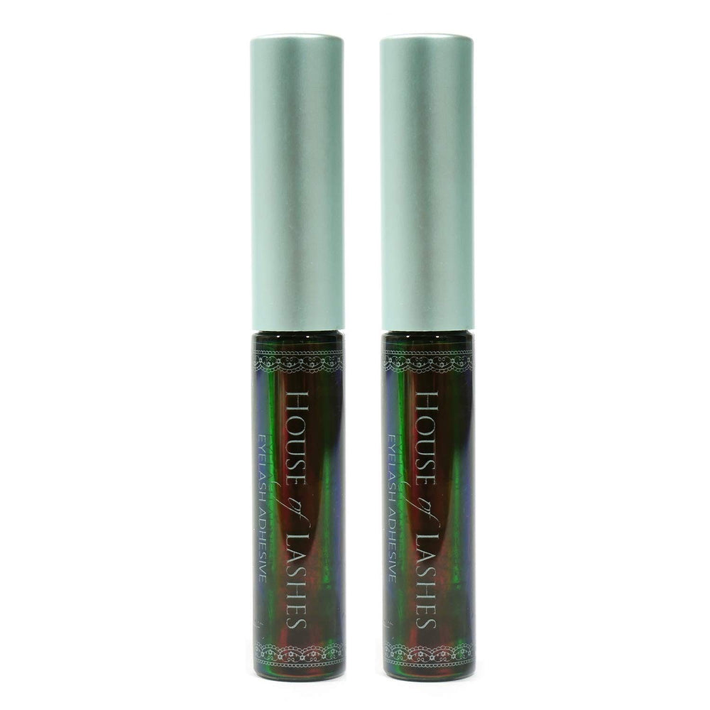 House of Lashes Dark Adhesive bottle close-up for long-lasting lash hold.