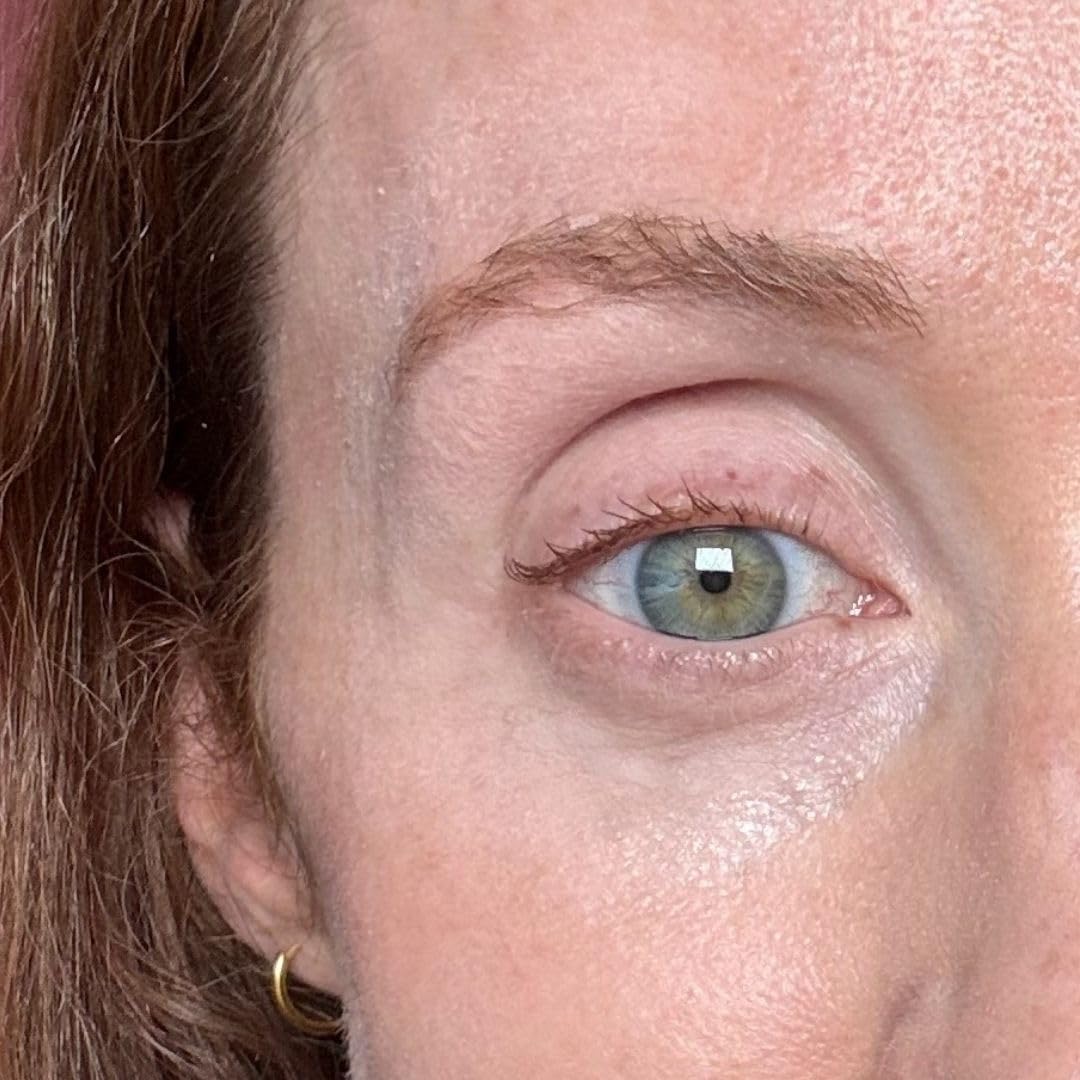 Under-eye application shot shows seamless blend.
