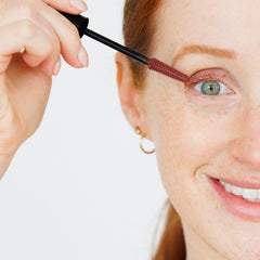 How to Be A Redhead Plum packaging shown for travel-friendly mascara.