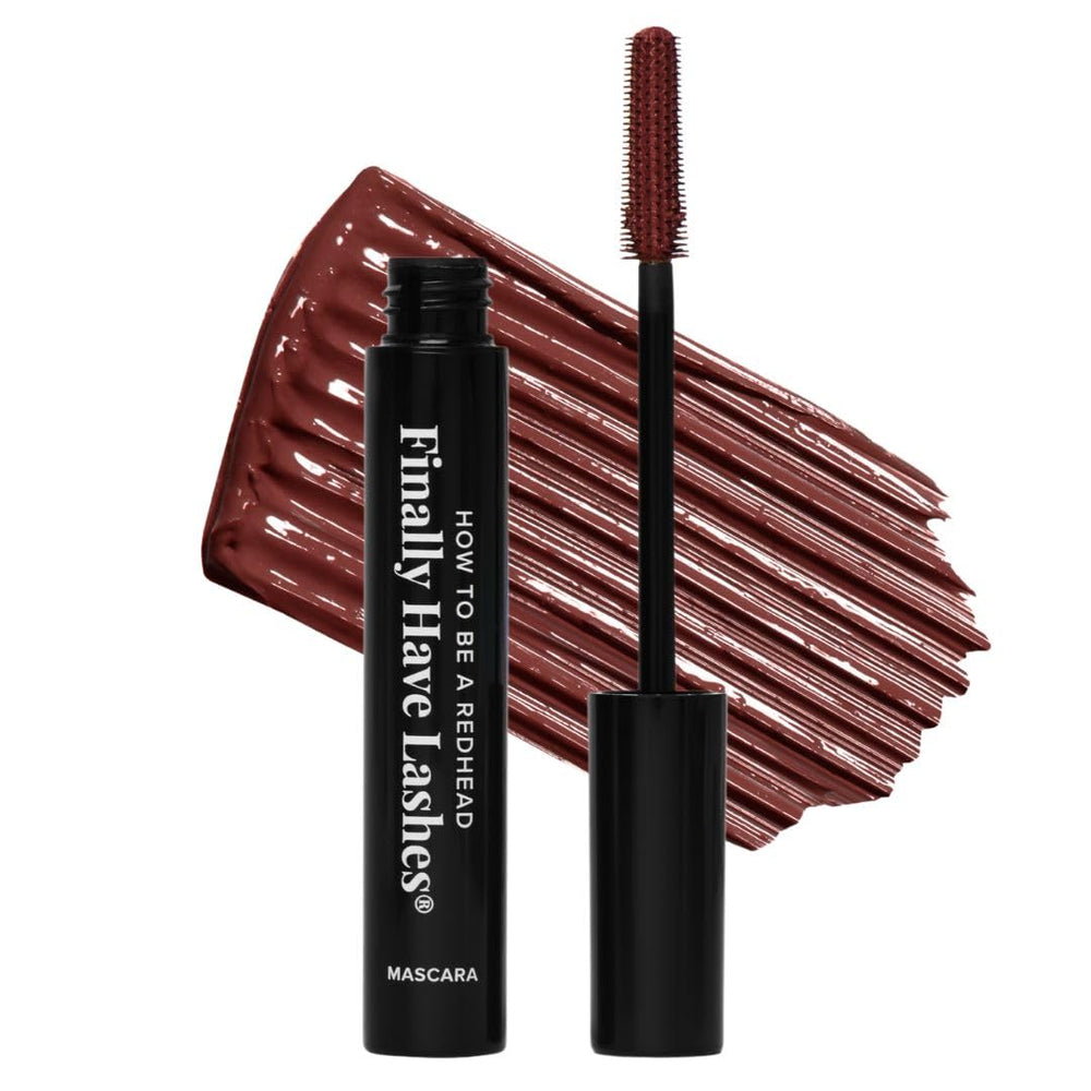 How to Be A Redhead Plum mascara wand demonstrates precise brush for defined lashes.