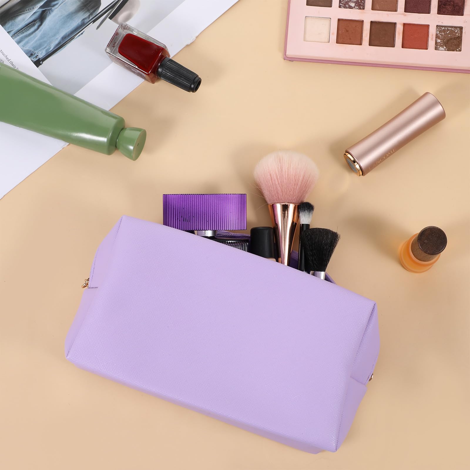 Hpmjz Preppy makeup bag in light blue keeps cosmetics organized while traveling.