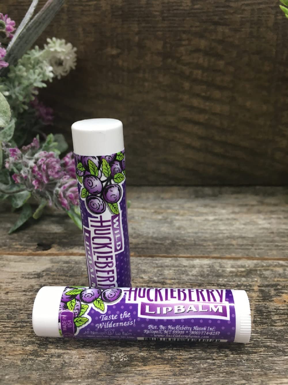 Huckleberry Haven lip balm swatch showing smooth hydration and berry aroma.
