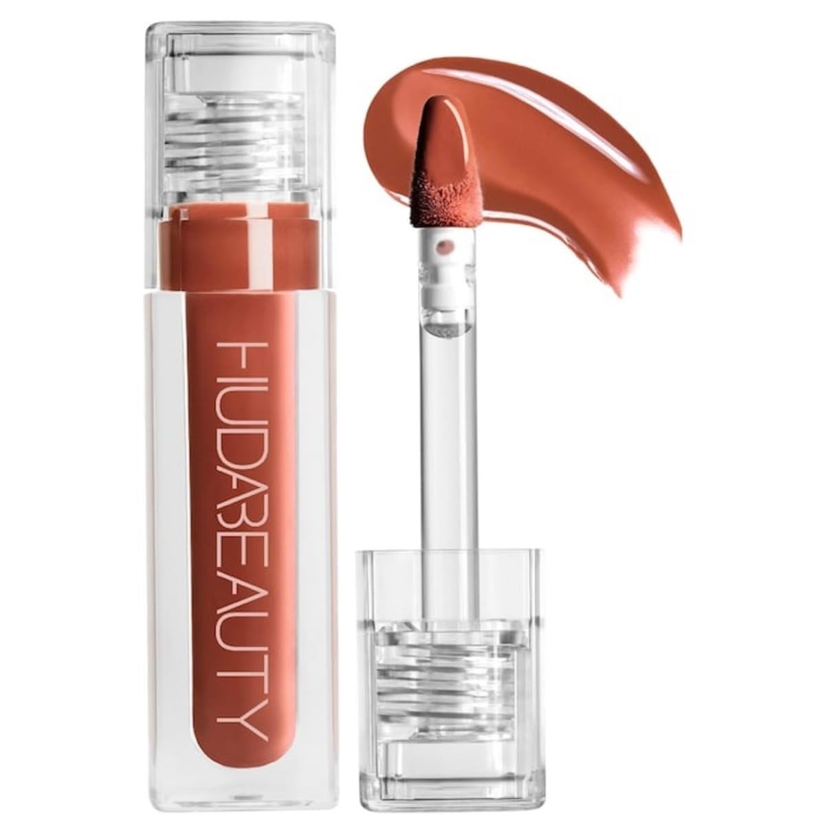 Huda Beauty Faux Filler Extra Shine Foxy bottle highlights hydrating formula for glossy lips.