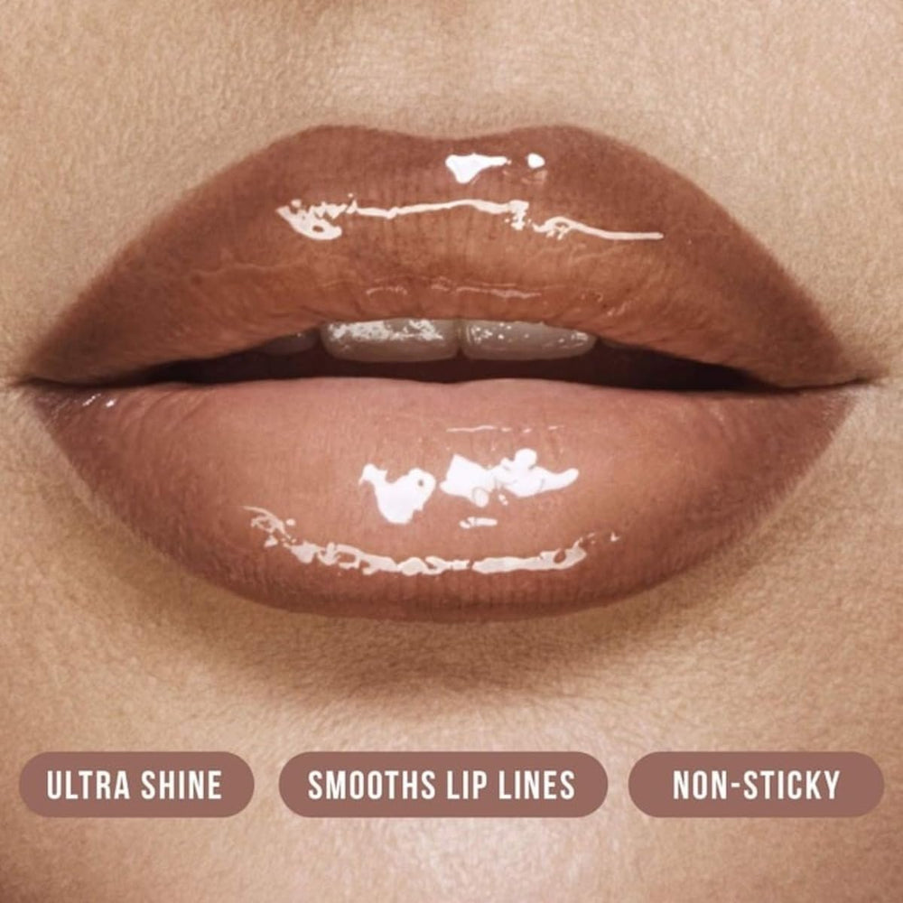 Huda Beauty Faux Filler Foxy lip gloss caramel brown shade adds glow.