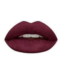 Huda Beauty Liquid Matte Lipstick Famous lip swatch demonstrates long wear color