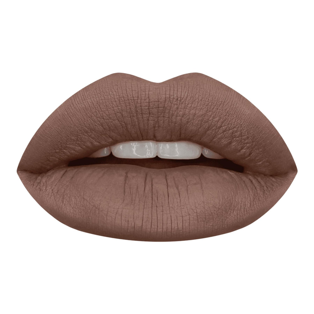 Huda Beauty Girlfriend lipstick application close-up showing creamy, long-wearing finish.