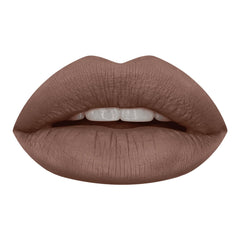 Huda Beauty Girlfriend lipstick application close-up showing creamy, long-wearing finish.