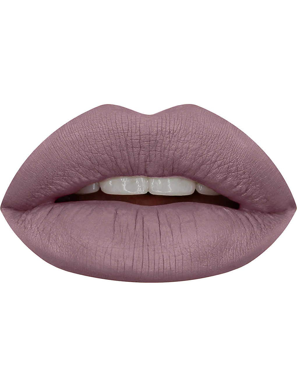 Huda Beauty Liquid Matte Muse on lips highlights matte finish and easy wear