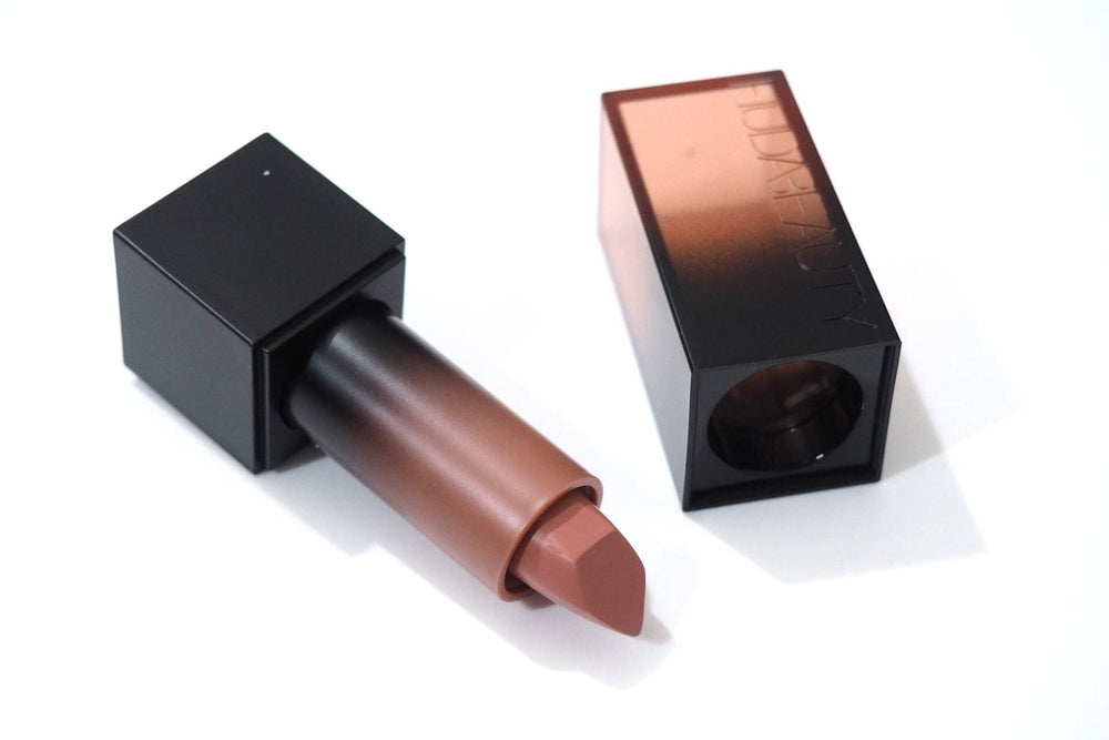 Huda Beauty Power Bullet Amore lipstick swatch shows creamy glow and hydrating finish
