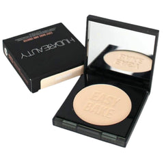 HUDA Beauty Poundcake compact open offering portable brightening for on-the-go touch-ups