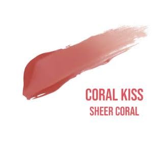 Huda Lip Blush Coral Kiss on lips for a natural matte tint.