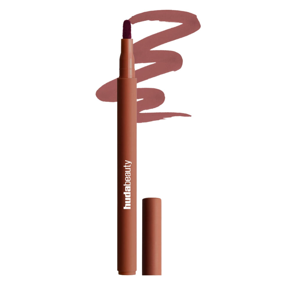 Huda Lip Contour Stain Warm Brown bottle closeup with rich pigmentation.