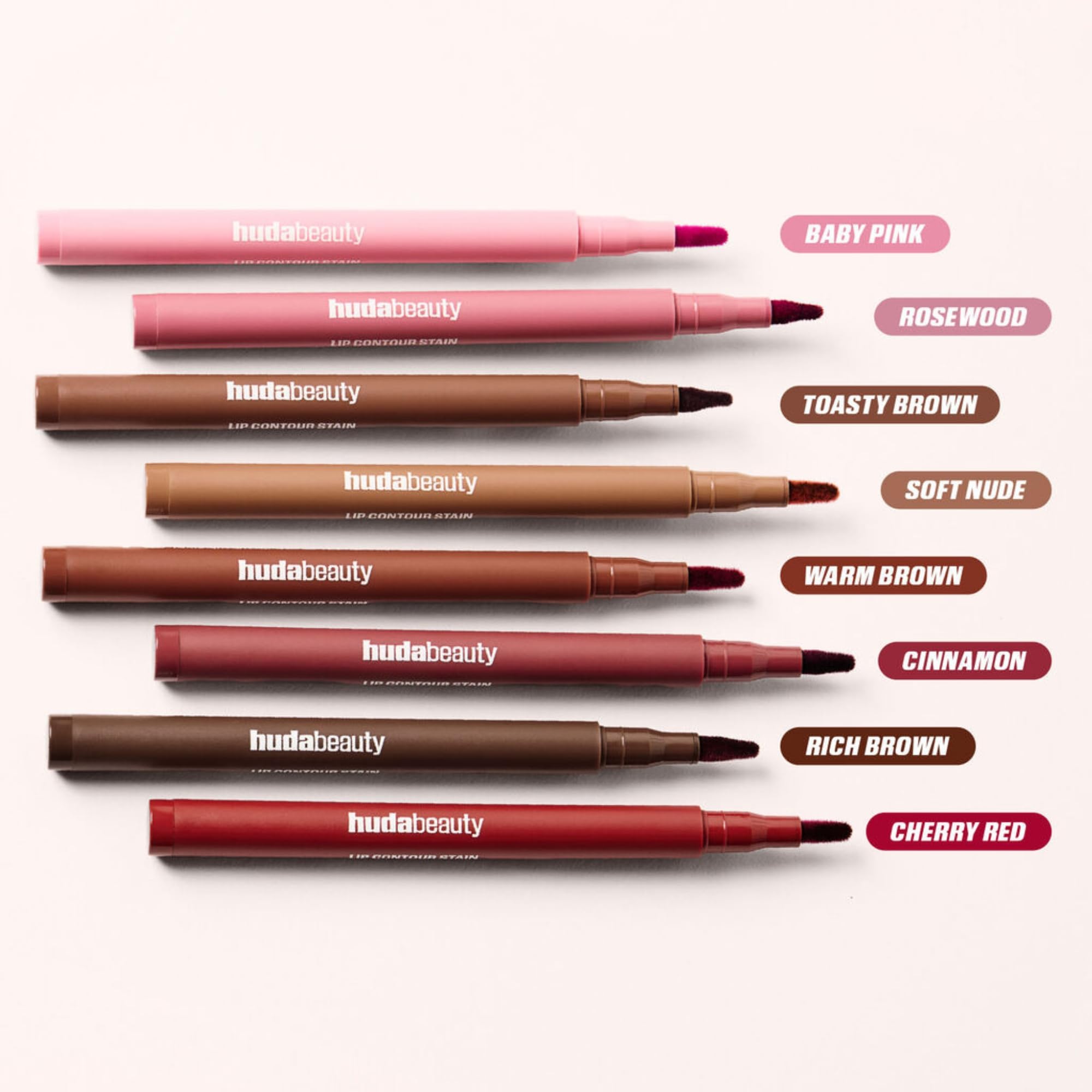 Huda Lip Contour Stain Warm Brown long-wear test demonstrates durable color.