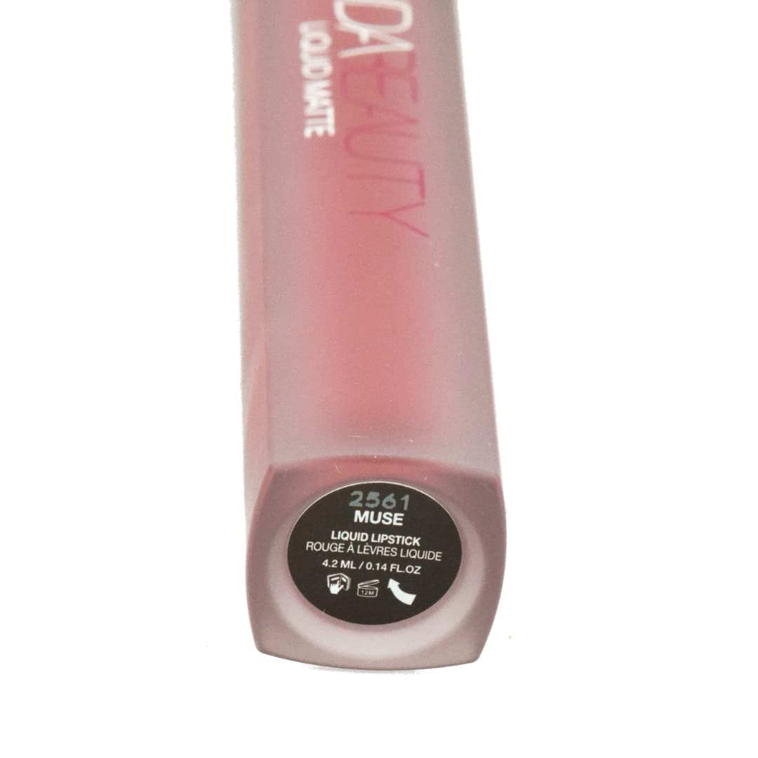 Huda Muse Liquid Matte Lipstick swirl application highlights easy one-swipe color with transfer-proof finish.
