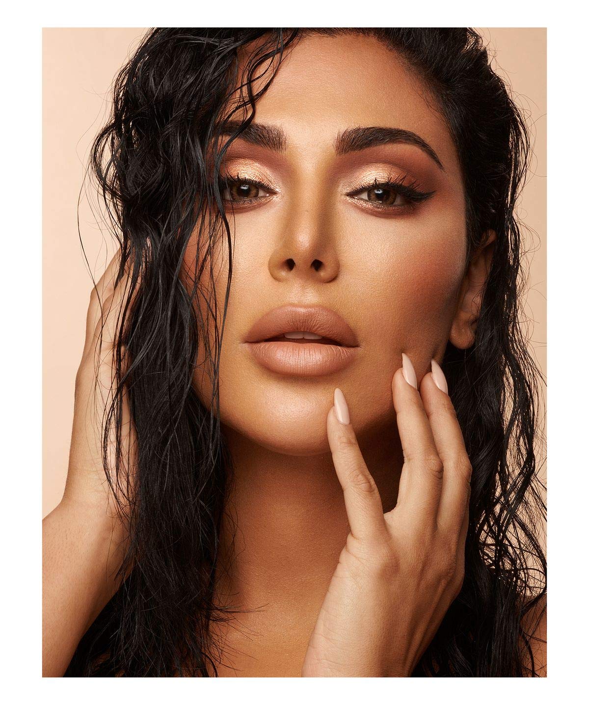 Huda Nude Eyeshadow Palette on eyes demonstrates versatile nude-to-metallic finish