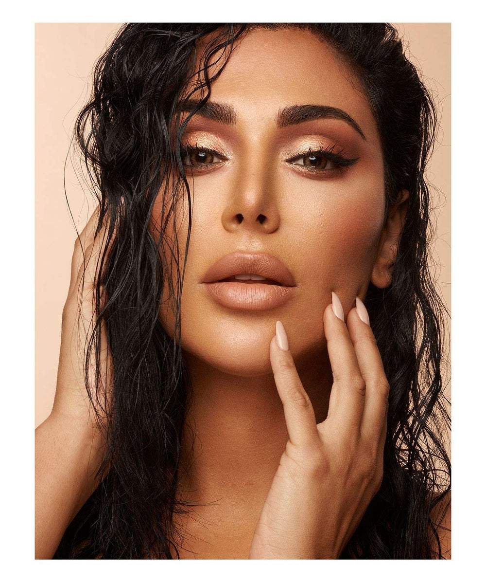 Huda Nude Eyeshadow Palette on eyes demonstrates versatile nude-to-metallic finish