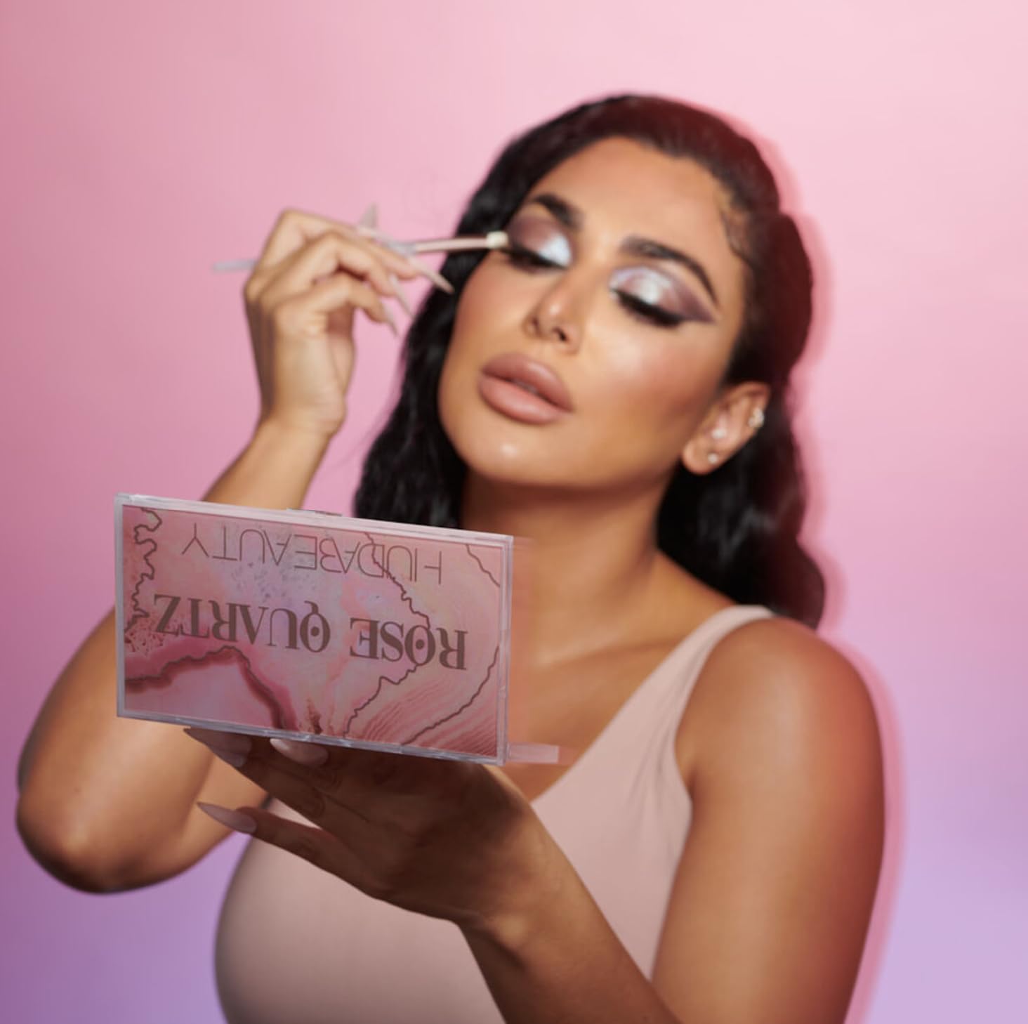 Huda Rose Quartz metallic shades provide high-shine finishes for luminous eyes