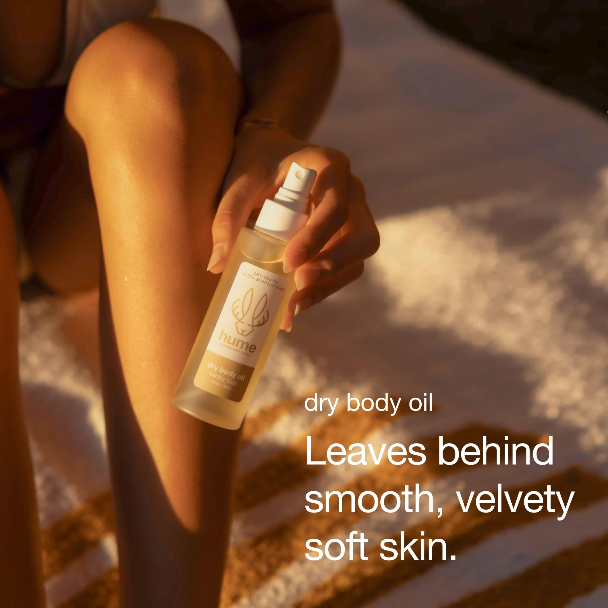 HUME SUPERNATURAL bottle with oil texture on skin for hydration.