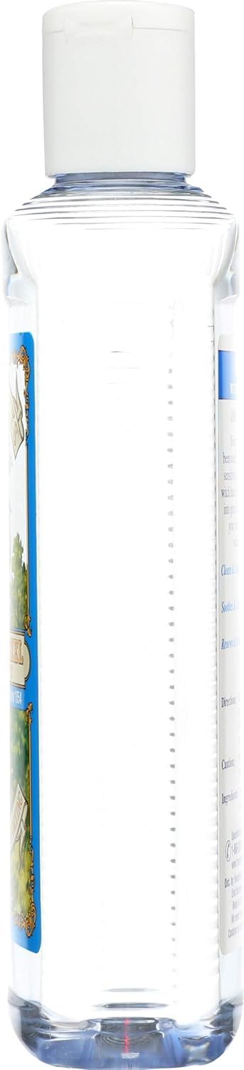 Humphreys Witch Hazel hand bottle during routine cleansing.