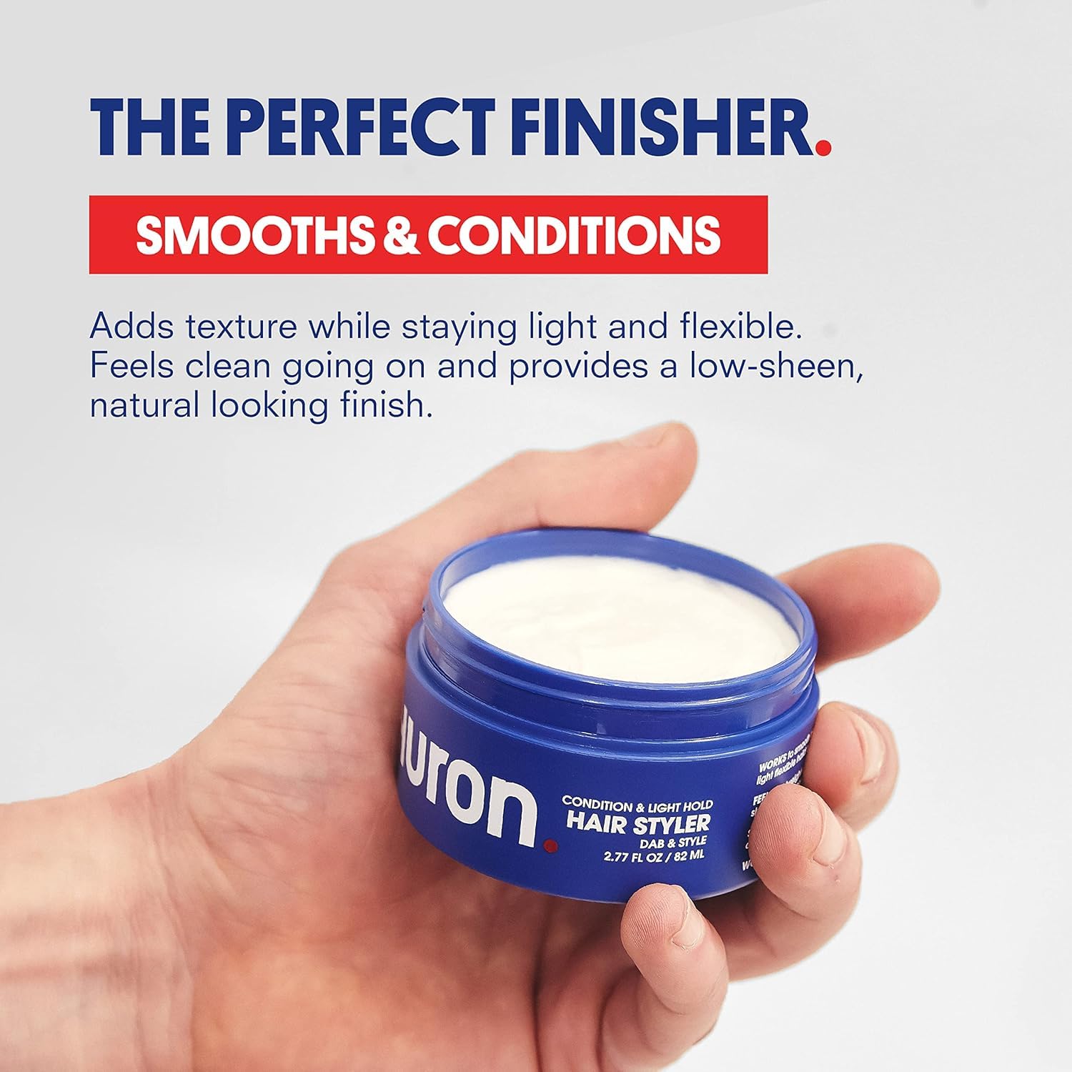 Huron Clean Citrus Woods hair styler texture on fingertips shows smooth, even application.