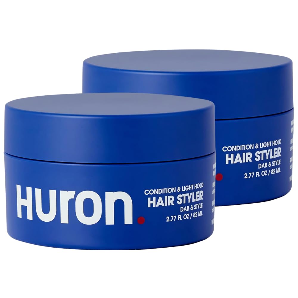 Huron Clean Citrus Woods hair styler jar close-up highlights lightweight hold and conditioning.