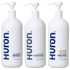 Huron Jumbo Shower Kit shampoo bottle with hydrating cleanse for refreshed hair.