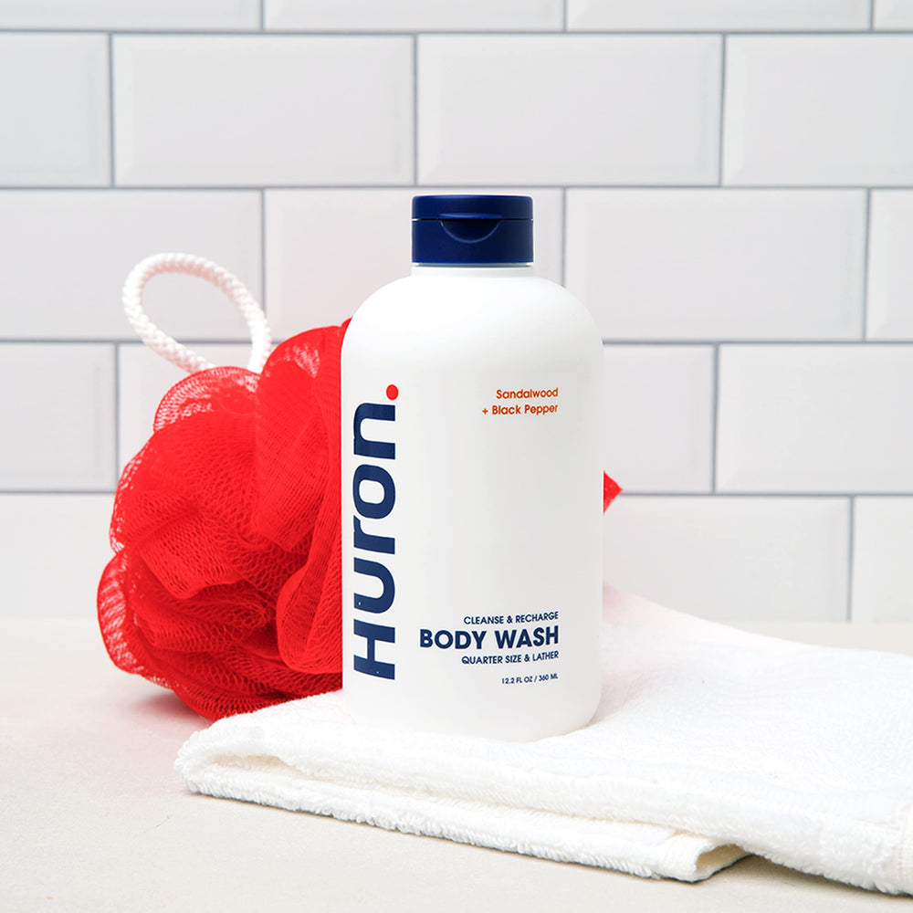 Huron men's body wash daily cleansing ritual shown beside sink