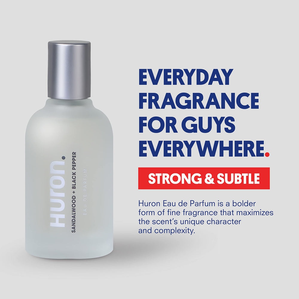 Huron men's cologne bottle at an angle showing elegant glass and modern design