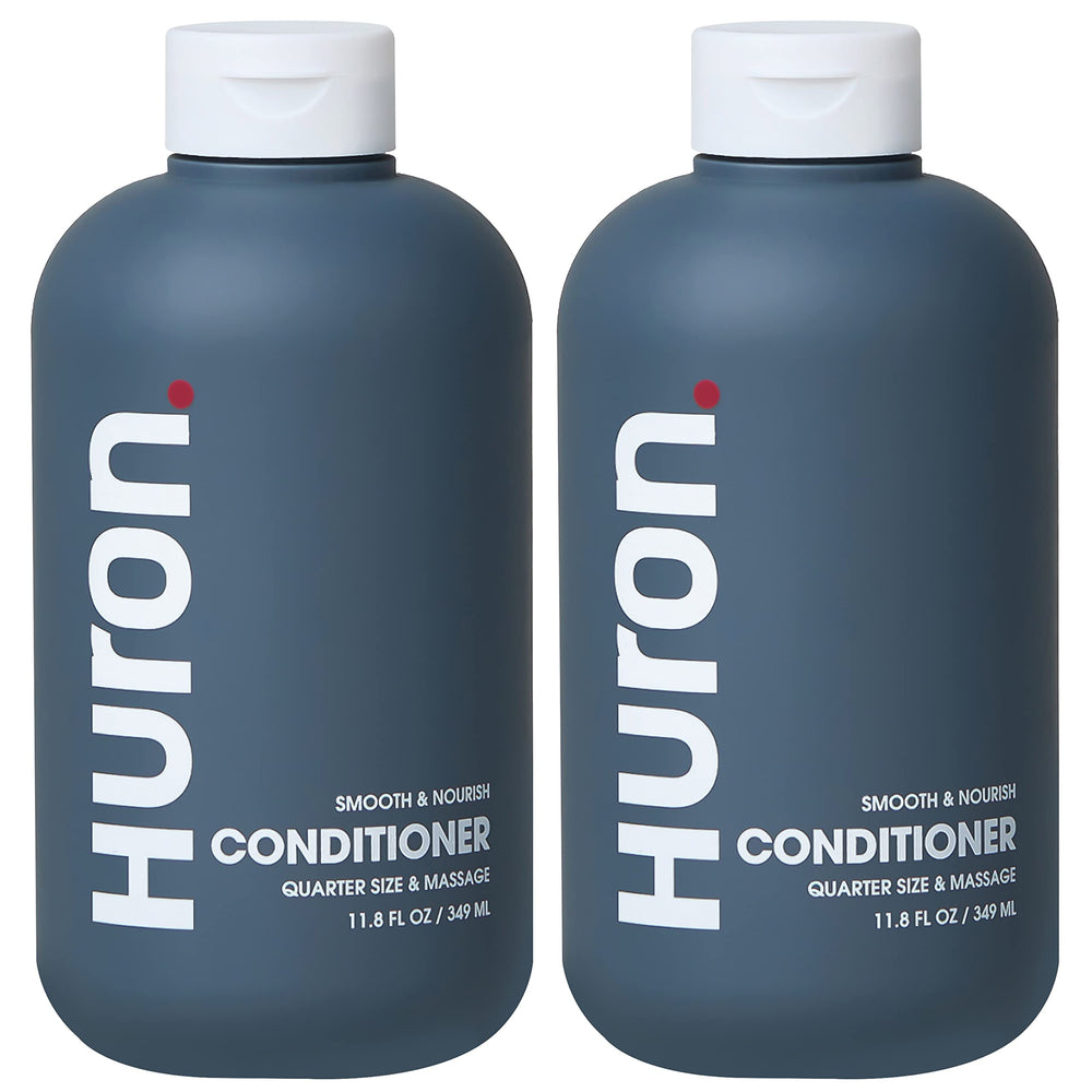 Huron Men’s Conditioner bottle front highlights lightweight hydration for frizz control.
