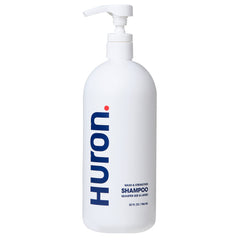 Huron Men's Fresh Scent Daily Shampoo bottle front with nourishing formula for fullness